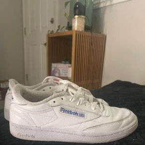 White with purple detail reeboks